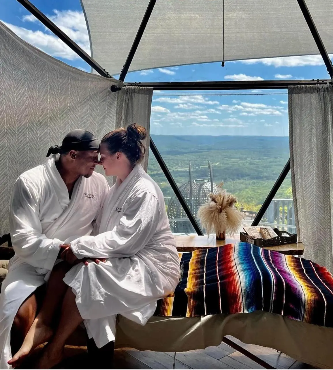 Mountain getaway setting with a massage setup.