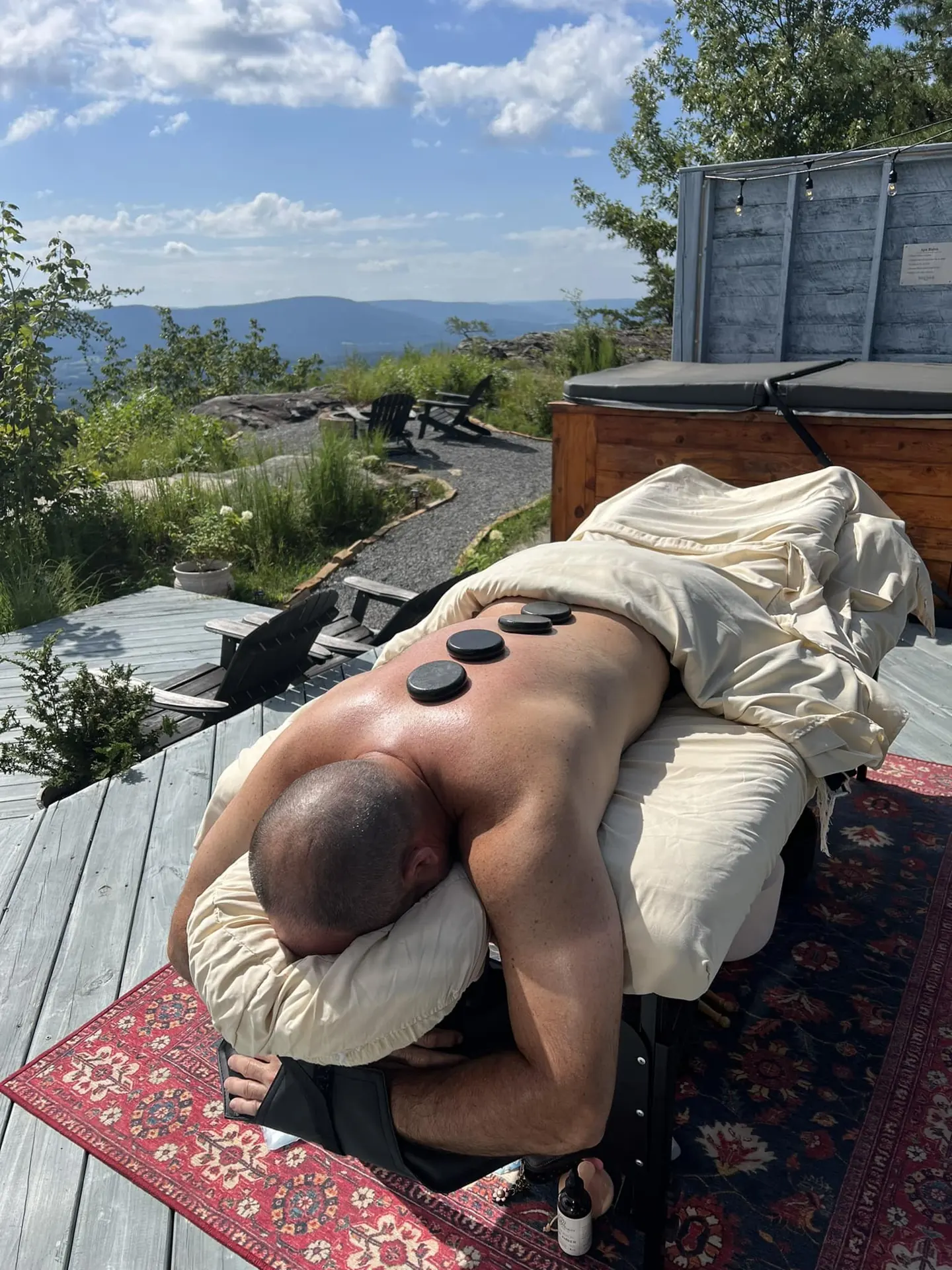 A mobile massage setup with a Tennessee mountain view.